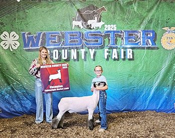 Champion Lightweight Market Lamb
Webster County Fair Shown
Shown by Charlotte Adam
Sired by “10”
